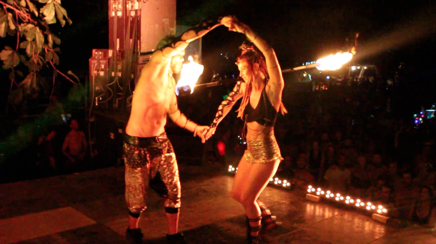 Lester and Samantha of Love in the Fire perform their fire dance duet at Envision Festival Uvita costa rica fire dance retreat 